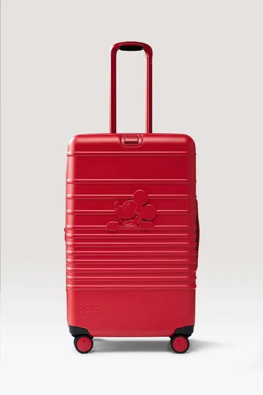 The Disney Medium Check-In Roller in Mickey Mouse Red made by Beis
