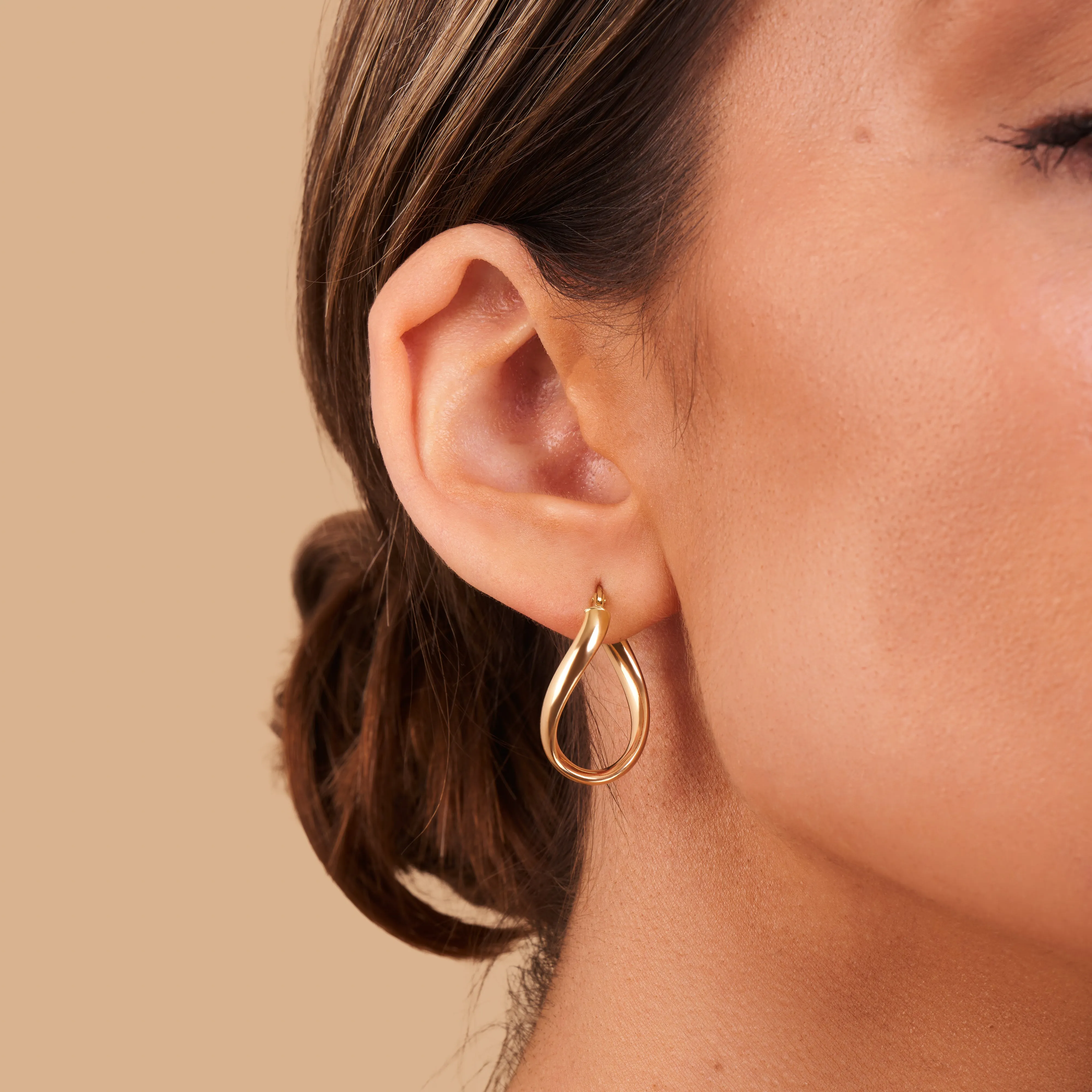 Twisted Gold Hoop Earrings - 18k sold by 7879 product image thumbnail 2