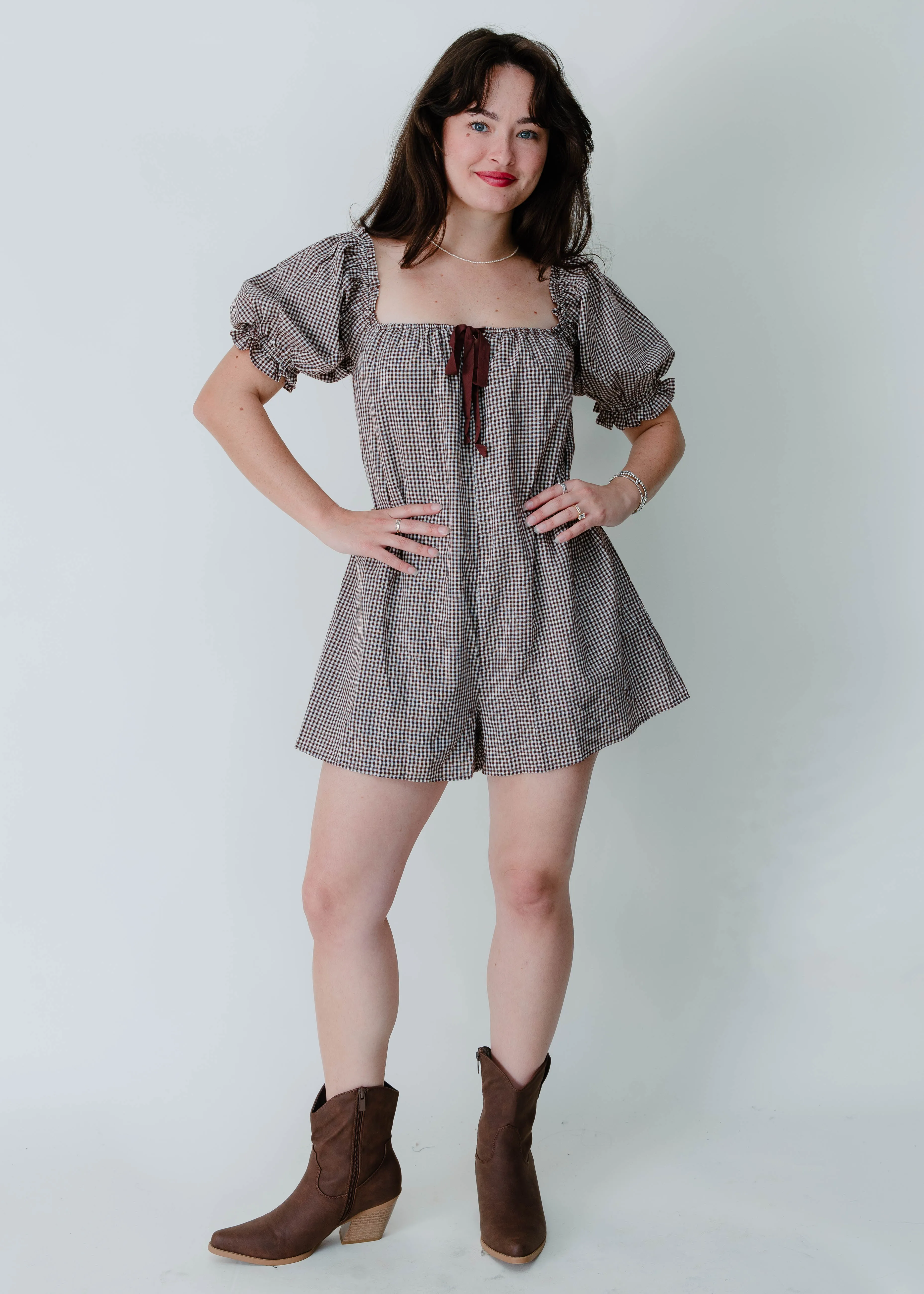 The Maddie Gingham Romper sold by Vinnie Louise