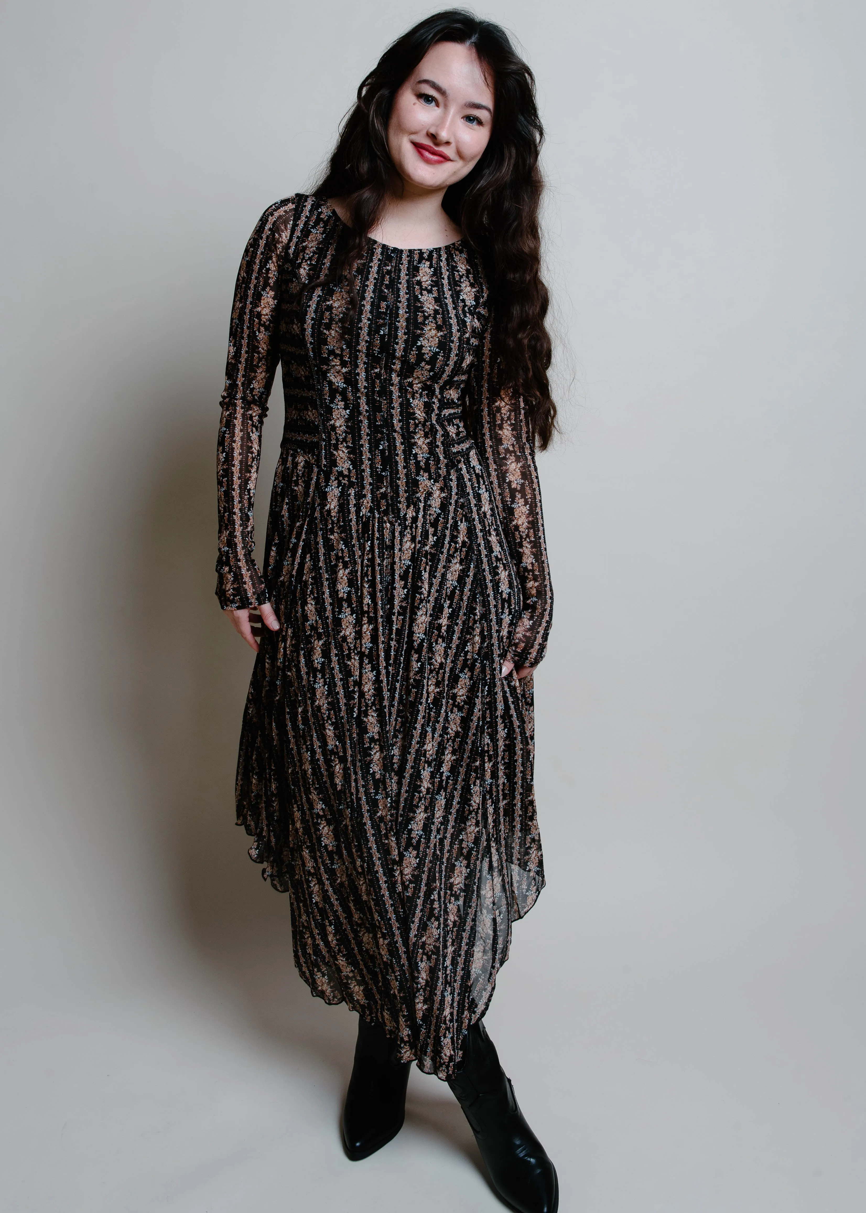 The Maya Floral Mesh Midi Dress sold by Vinnie Louise