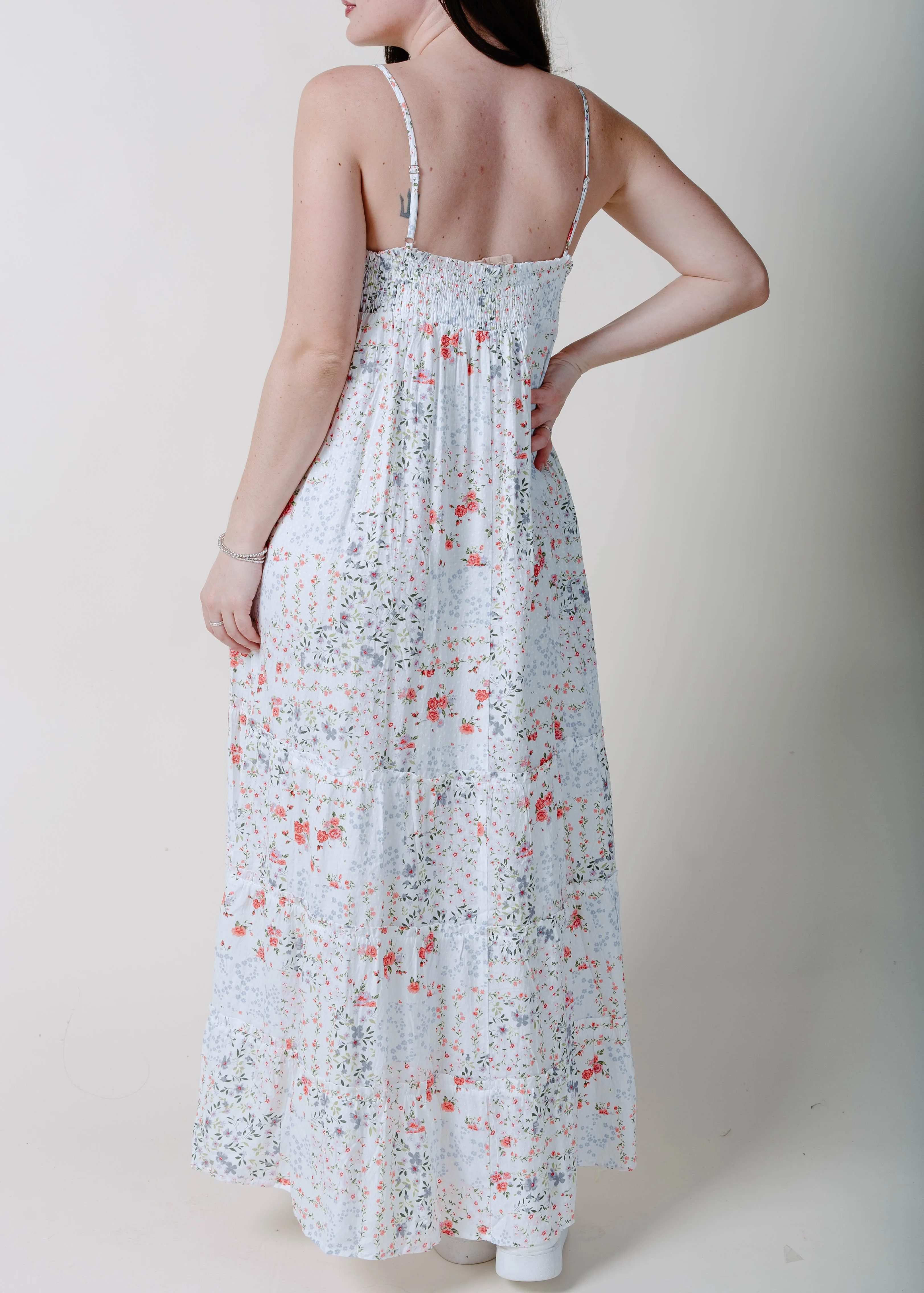 The Athena Ruffle Maxi Dress sold by Vinnie Louise