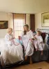 Samantha Varvel x Smock London Women's Nightingale Dress Moonstone White with Candy Cane Trim and Holly Hand Smocking sold by Smock London