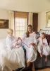 Samantha Varvel x Smock London Women's Nightingale Dress Moonstone White with Candy Cane Trim and Holly Hand Smocking sold by Smock London