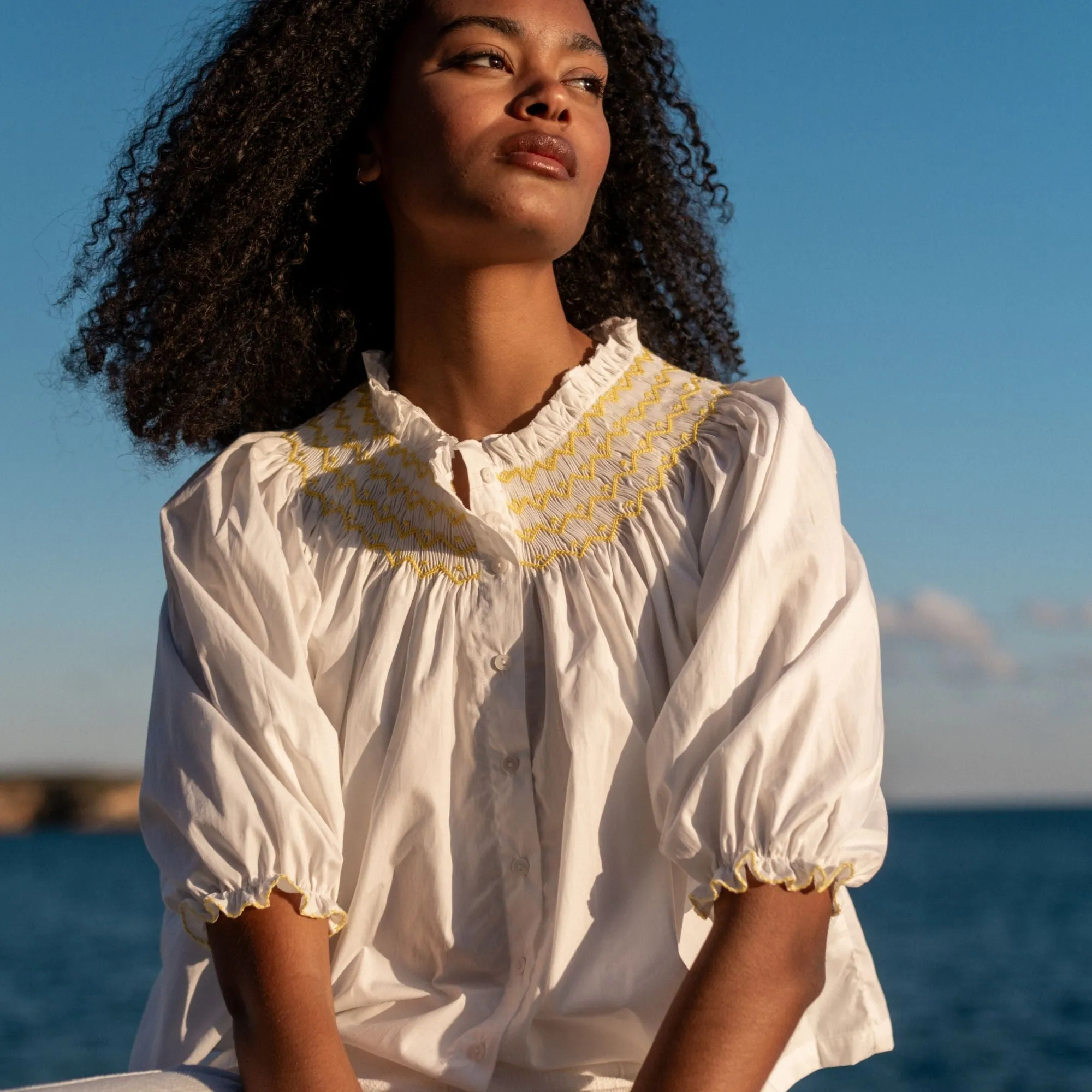 Small Cleopatra Blouse White with Sunshine Hand Smocking sold by Smock London