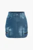 Uhyggeligt klaplomme denim nederdel sold by Micas