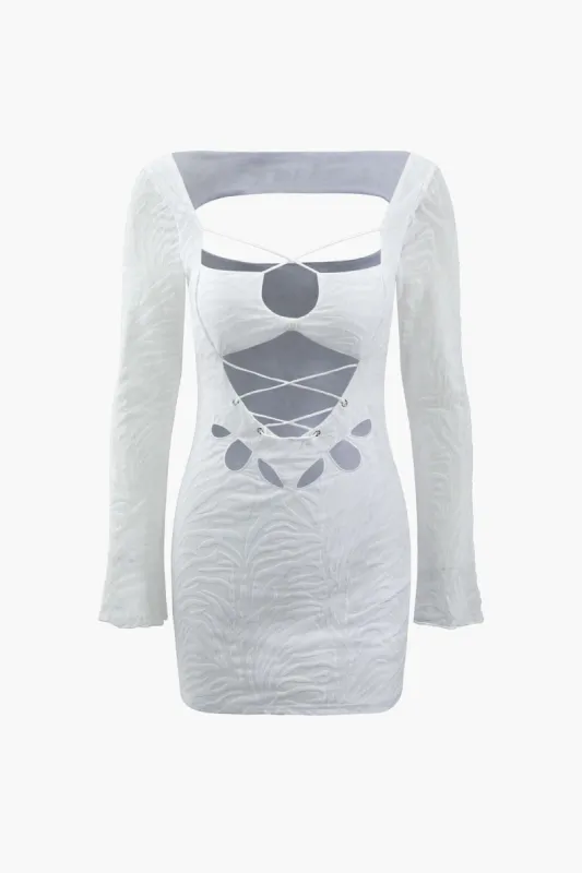 Flocked Mesh Cut Out Bodycon Mini Dress sold by Micas