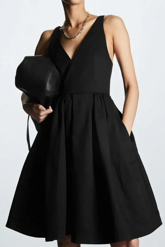 Solid V-neck Pleated Midi Dress sold by Micas
