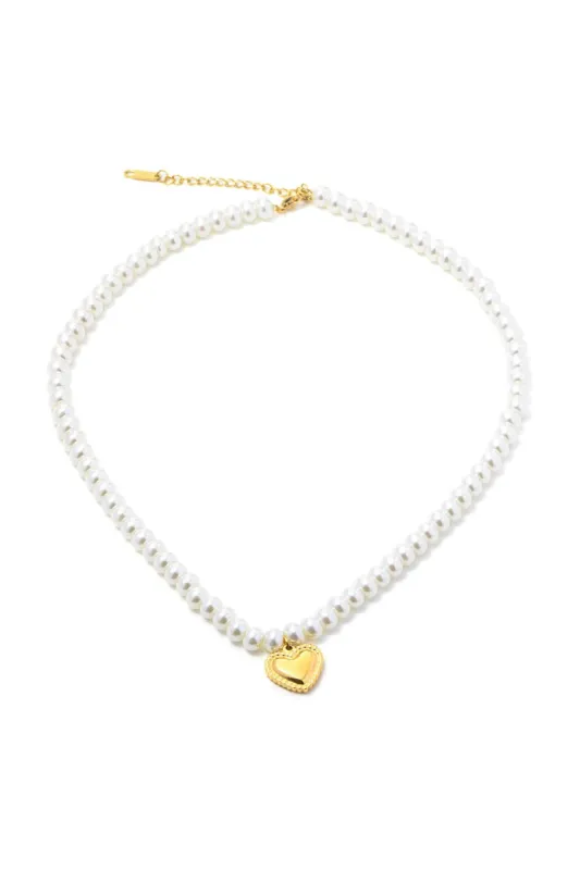 Heart Charm Pearl Necklace sold by Micas