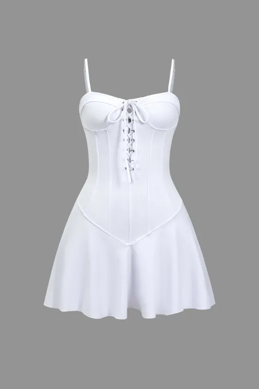 Solid Tie-Up Braided Eyelet Zipper Slip Mini Dress sold by Micas