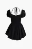 Solid Tie Halter Ruched Mini Dress sold by Micas