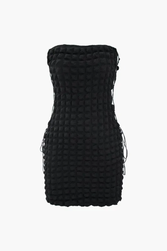 Popcorn Textured Tie Side Strapless Mini Dress sold by Micas