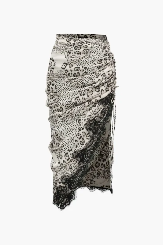 Asymmetrisk trykt trækknapskinus trim nederdel sold by Micas