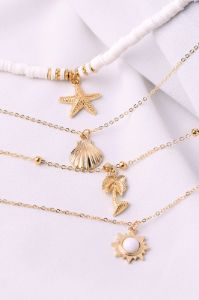 Starfish & Shell Pendant Layered Necklace sold by Micas
