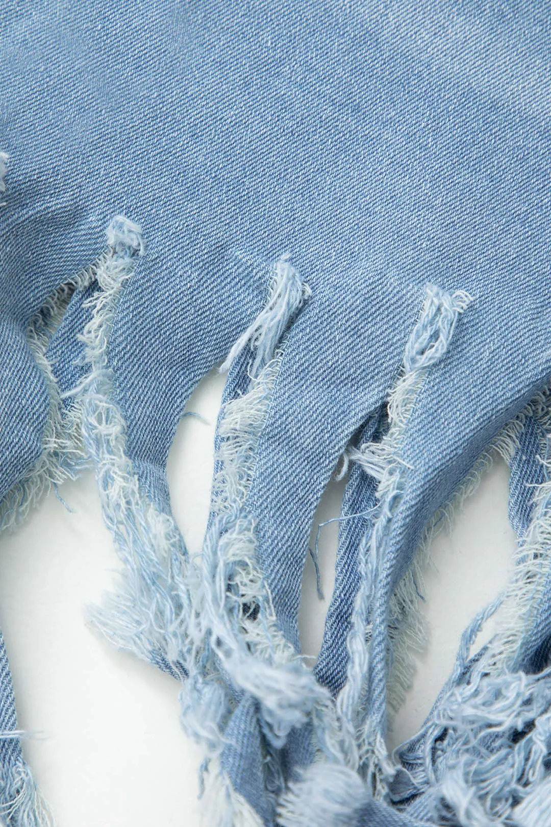 Fringe Hem Denim Shorts sold by Micas product image thumbnail 3
