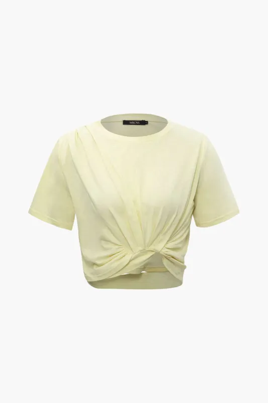 Solid Twist Hem T-Shirt sold by Micas