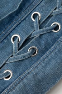 Eyelet Tie Denim Mini Skirt sold by Micas
