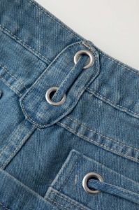 Eyelet Tie Denim Mini Skirt sold by Micas