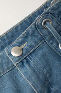 Eyelet Tie Denim Mini Skirt sold by Micas
