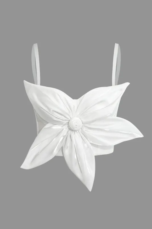 3D-blomstret krog-og-øje-korsettop sold by Micas