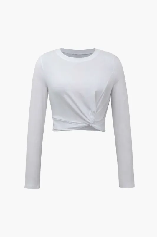 Twist Hem Long Sleeve Top sold by Micas