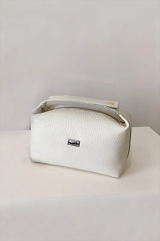 Bærbar clutch taske sold by Micas