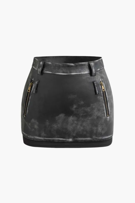 Faux Leather Distressed Zipper Pocket Mini Skirt sold by Micas