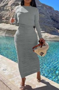 Solid Round Neck Long Sleeve Top And Ruched Maxi Skirt Set sold by Micas