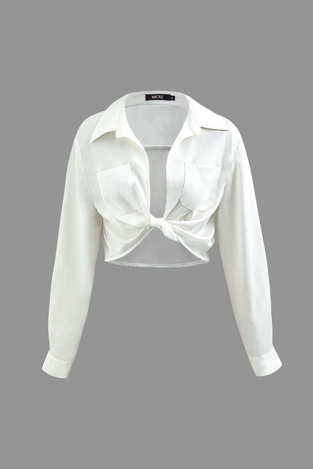 V-neck Twist Hem Chest Pocket Blouse sold by Micas