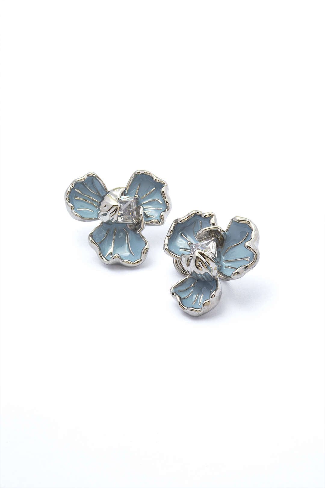 Flower Clip Earrings sold by Micas