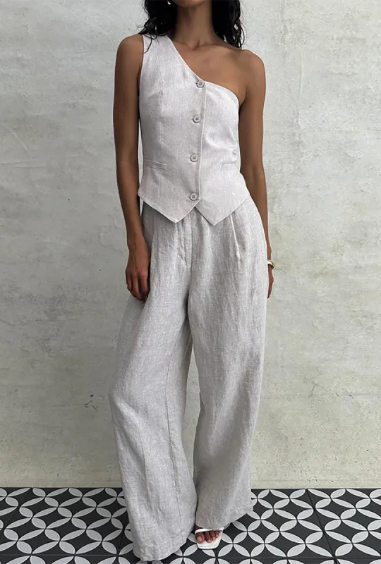 Solid Button Asymmetrical Vest And Trouser Set sold by Micas