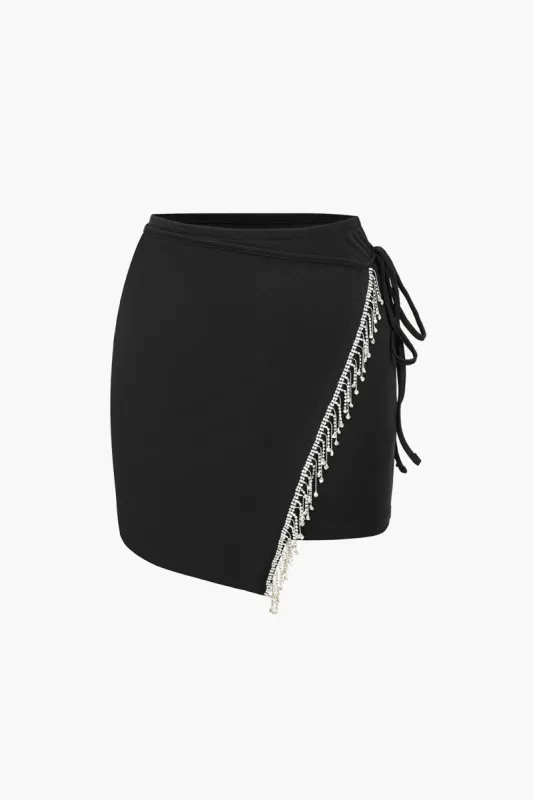 Solid Fringe Rhinestone Mini Skirt sold by Micas