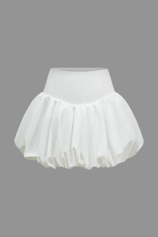 Solid Ruched Puff Mini Skirt sold by Micas