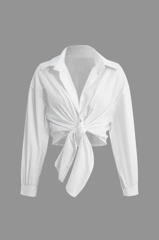 Solid knudet langærmet skjorte sold by Micas