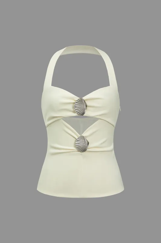 Solid udskåret shell cami top sold by Micas