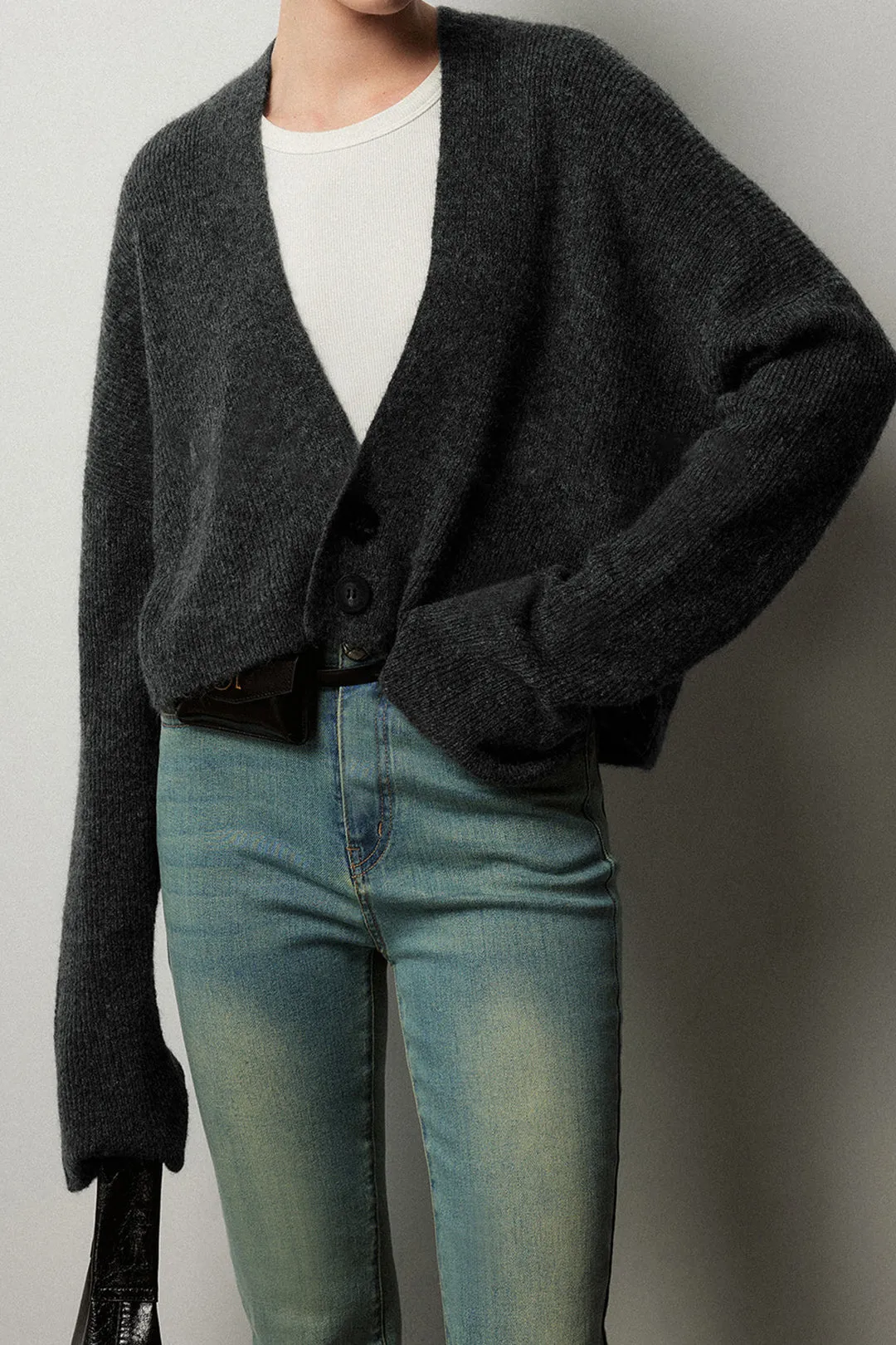 Solid Knit Button Asymmetrical Cardigan sold by Micas