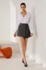 Solid Pleated Tie Mini Skirt sold by Micas