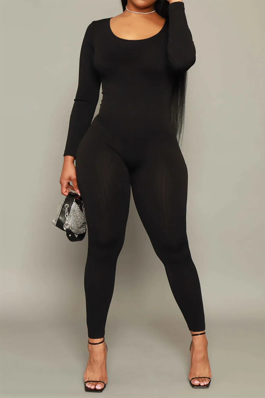 Plus størrelse solid lynlås langærmet jumpsuit sold by Micas