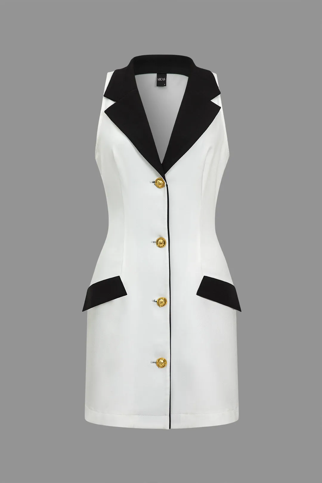 Minikjole med kontrastknap sold by Micas