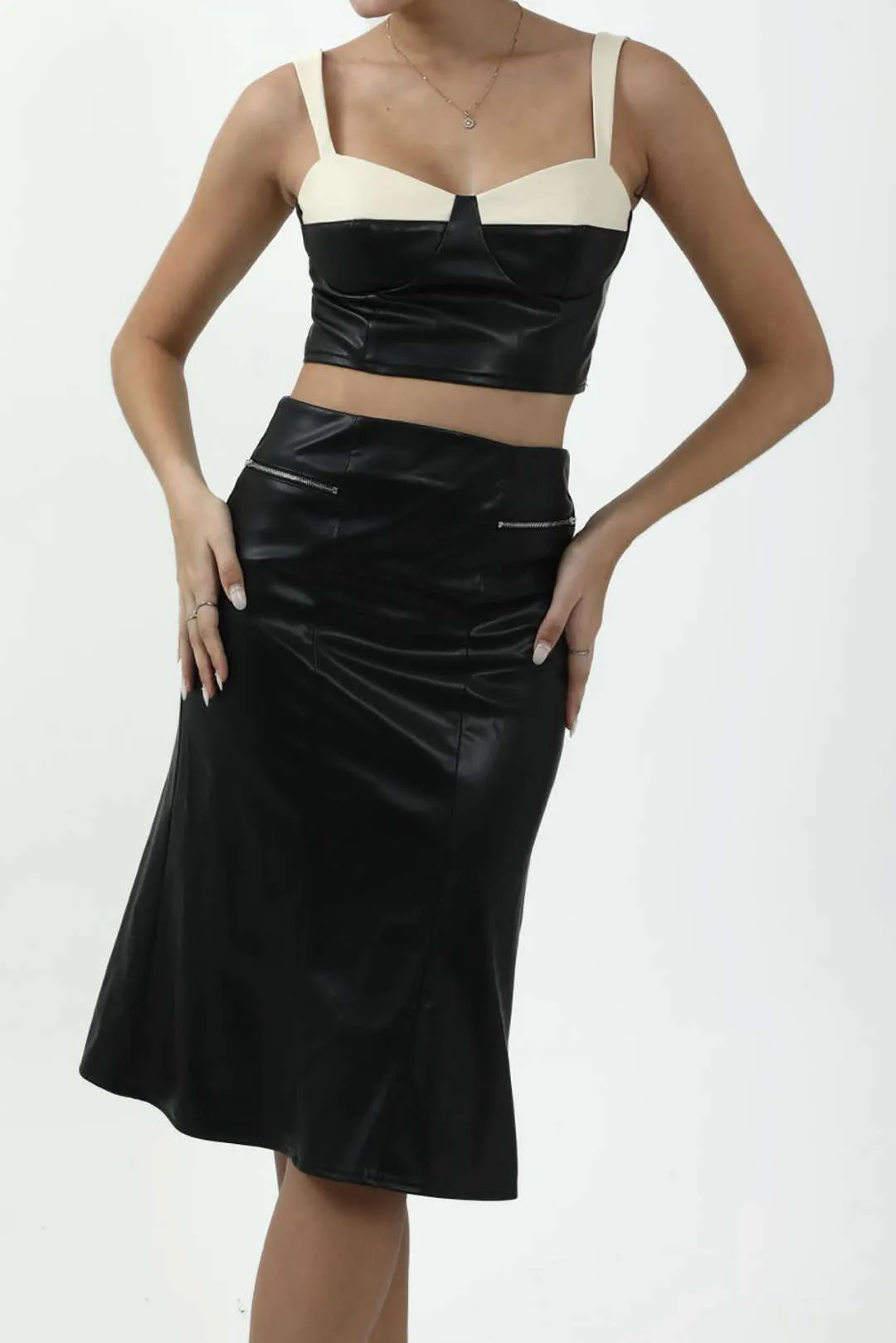 Solid Faux Leather Zipper Skirt sold by Micas