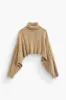 Basic solid strik mock hals langærmet top sold by Micas