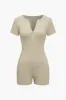 Solid lynlås kortærmet romper sold by Micas
