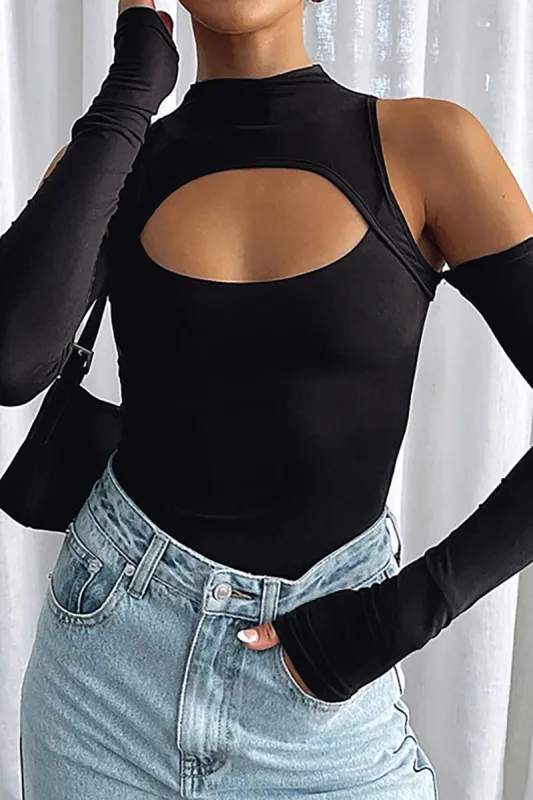 Solid udskåret langærmet bodysuit sold by Micas