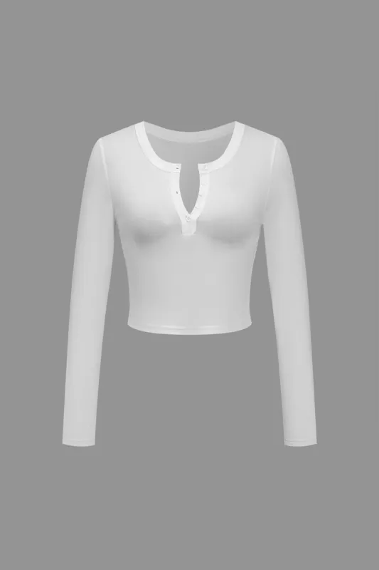 Solid langærmet knap top sold by Micas