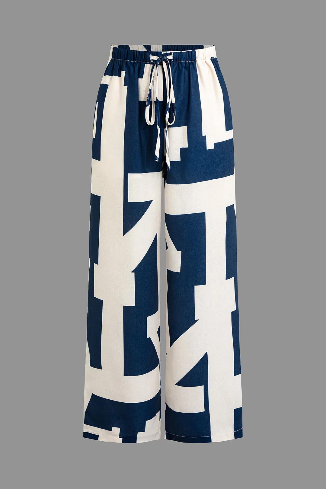 Geometrisk udskrivningsbinding foran bukser sold by Micas