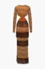 Bohemian Print Side Slit Fringe Trim Cut Out V-Neck Midi Dress sold by Micas