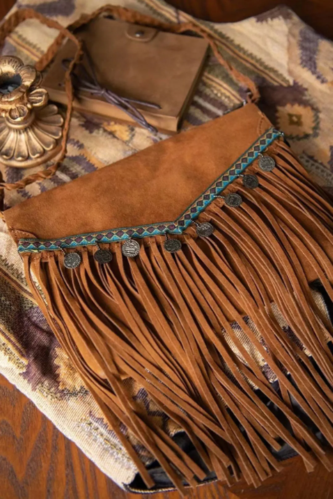 Imitation Suede Fringe Cross-body taske sold by Micas