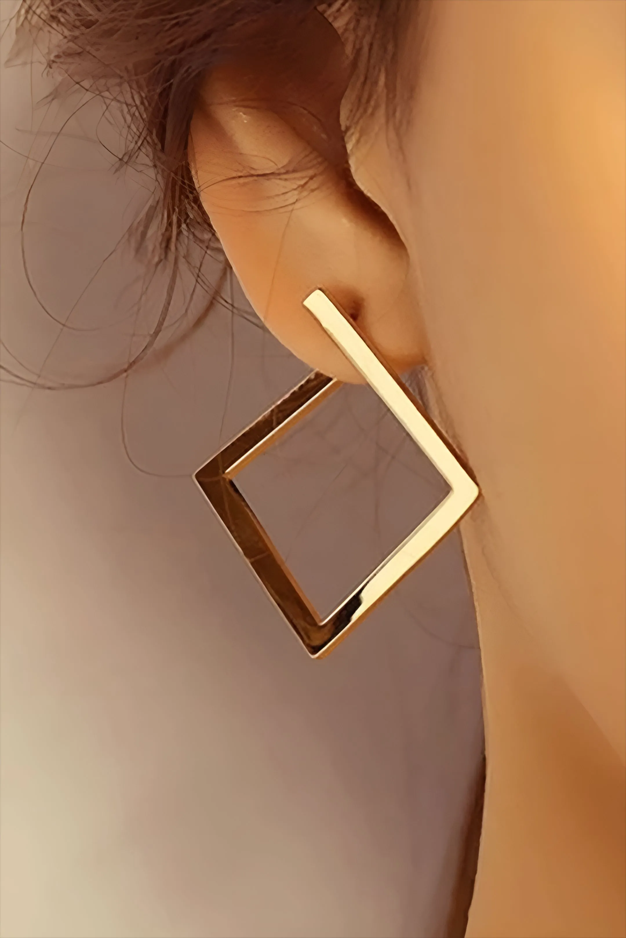 Diamond-Shaped Earrings sold by Micas