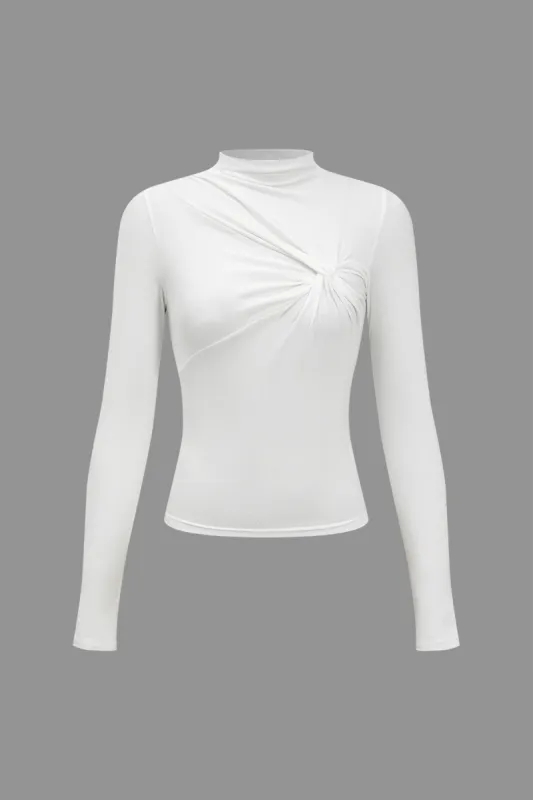 Solid Twist Knot langærmet top sold by Micas