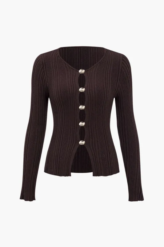 Solid strikket langærmet top sold by Micas