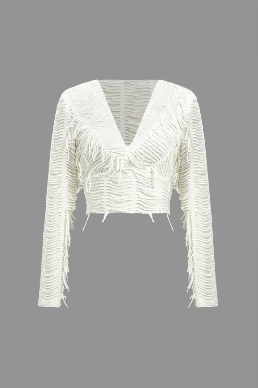 Solid rippet twist knude langærmet top sold by Micas